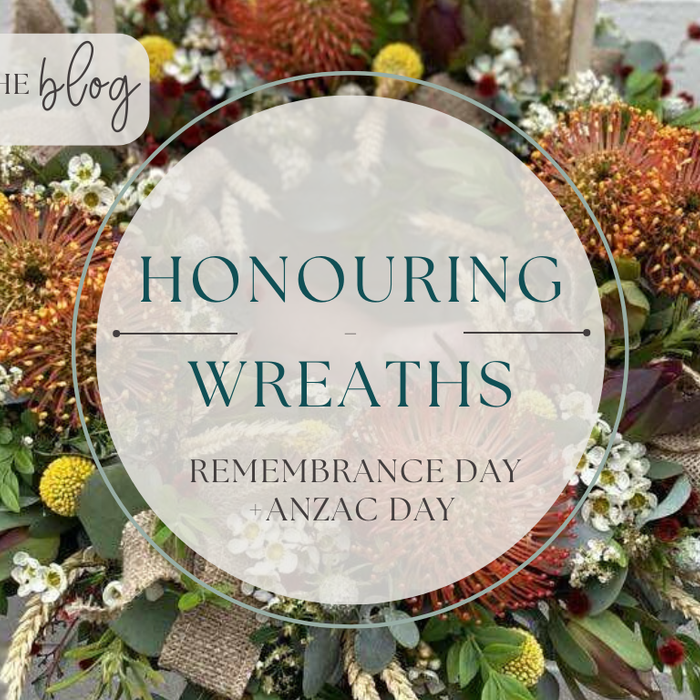 remembrance day wreath with red poppies and laurel leaves handcrafted by ireland’s florist sunbury
